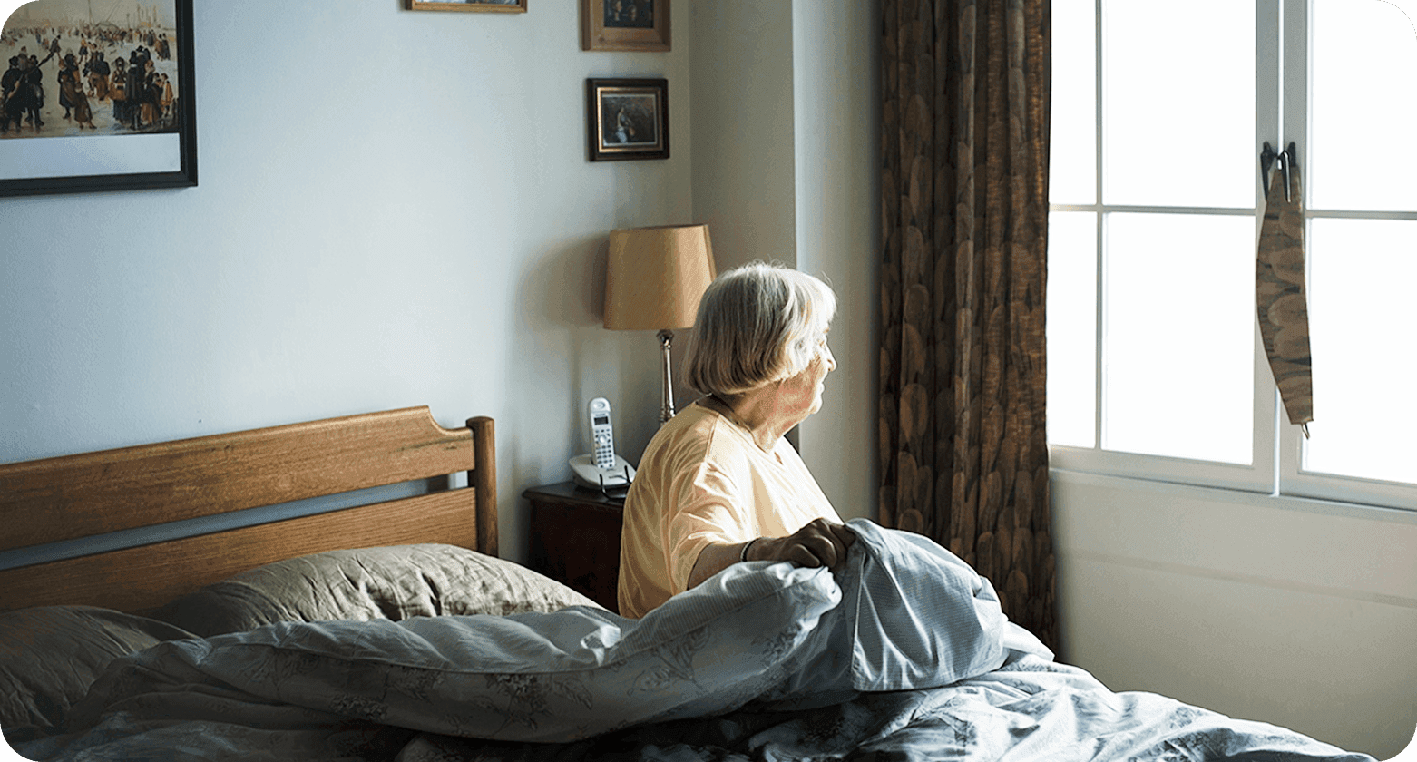 Woman sitting by the window